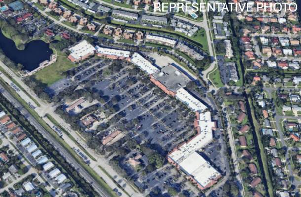 Grocery Anchored Shopping Center - 83% Occupied